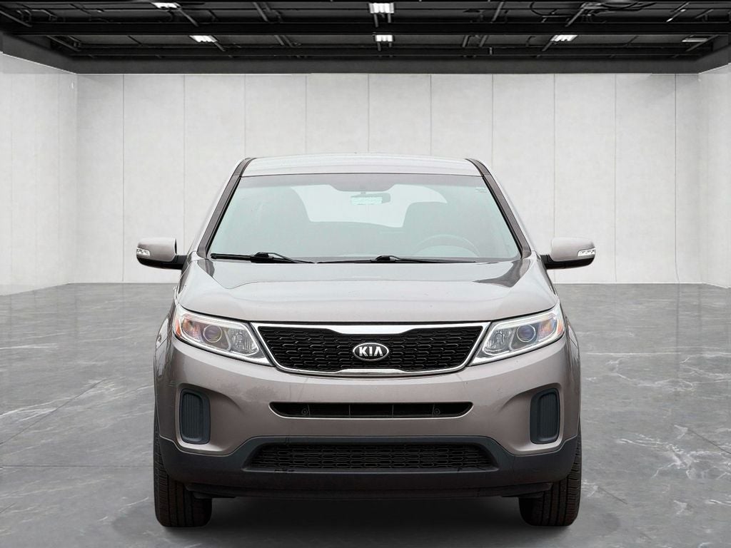Used 2015 Kia Sorento LX with VIN 5XYKT3A6XFG600077 for sale in Lansing, MI